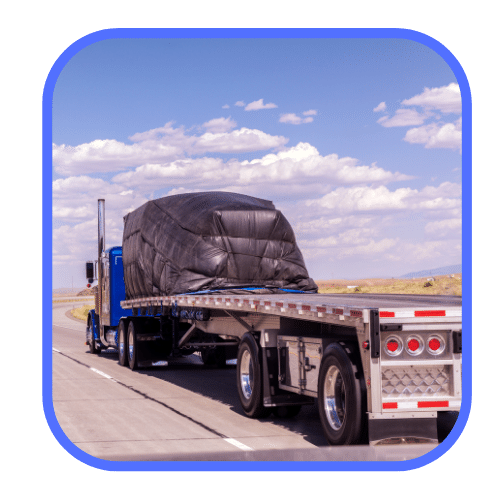 truck carrying large item for removal